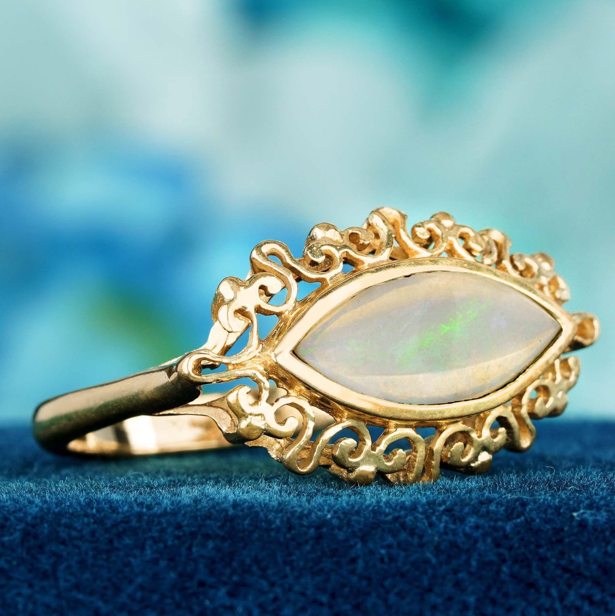 Ring aus massivem 9 Karat Gold mit natürlichem Opal in Marquise-Form in Lünettenfassung im Vintage-Stil (Edwardian) im Angebot