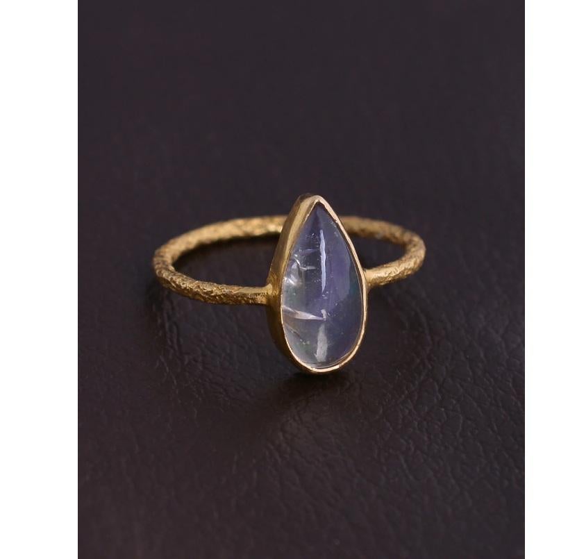 This ring is made of solid 18K yellow gold and has a beautiful opal gemstone texture. It would make a great addition to any jewelry collection.

Specifications

Dimensions: Length: 1.3 cm, Width: 0.7 cm
Gross Weight: 1.740 gms
Gold Weight: 1.430