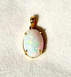 12.62ct Ethiopian opal stone in 14k yellow gold for pendant