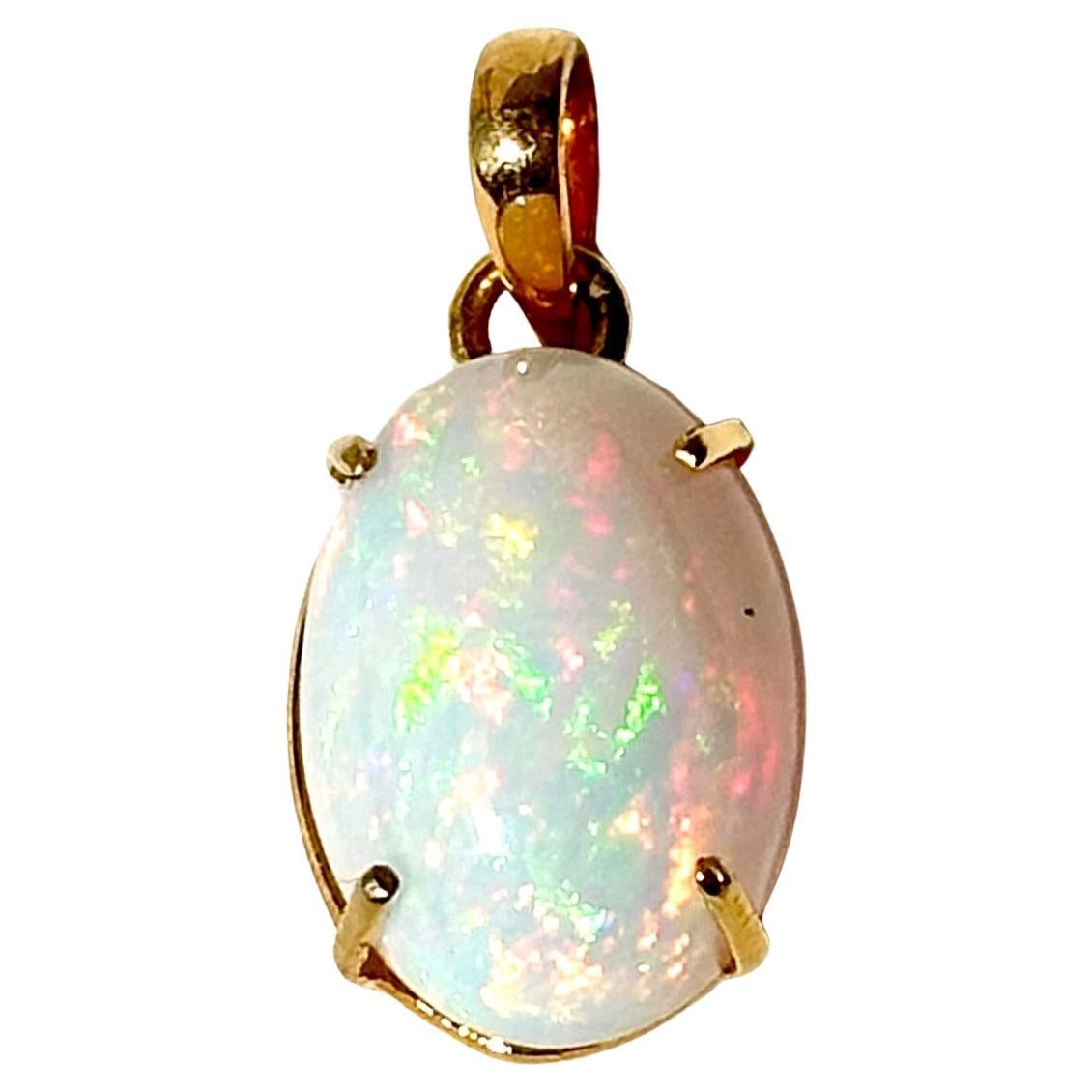 12.62ct Ethiopian opal stone in 14k yellow gold for pendant For Sale