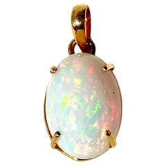 12.62ct Ethiopian opal stone in 14k yellow gold for pendant