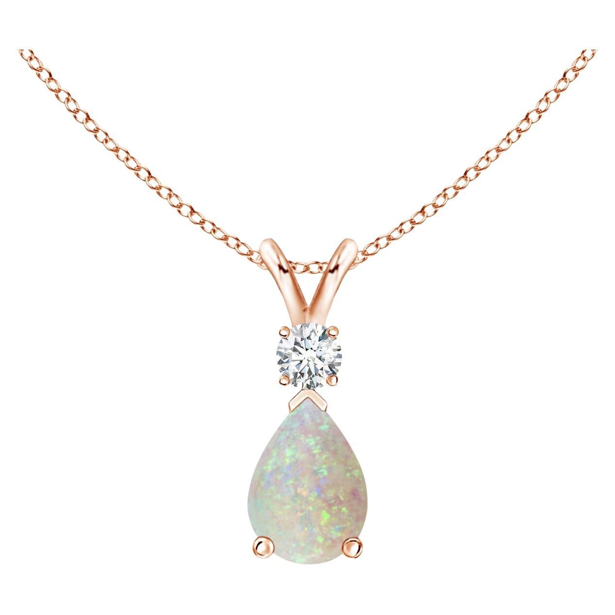 ANGARA Natural 0.42ct Opal Teardrop Pendant with Diamond in 14K Rose Gold For Sale