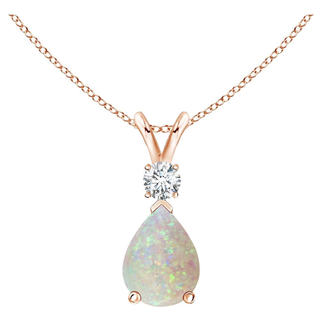 ANGARA Natural 0.70ct Opal Teardrop Pendant with Diamond in 14K Rose Gold For Sale