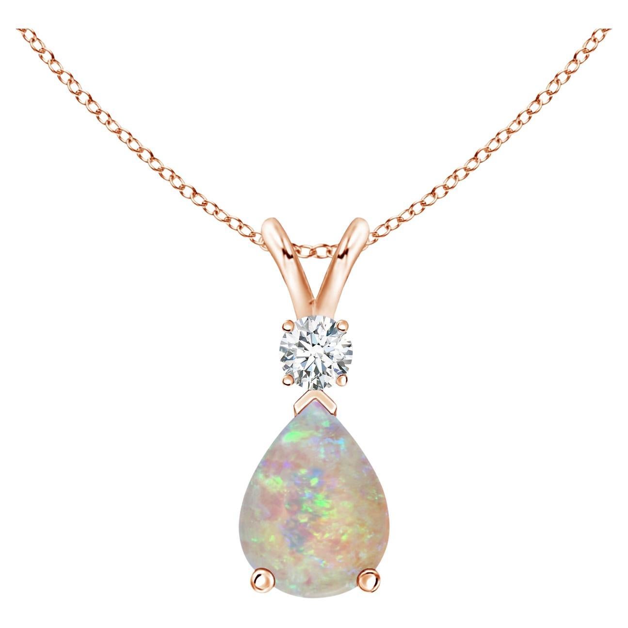 ANGARA Natural 0.70ct Opal Teardrop Pendant with Diamond in 14K Rose Gold For Sale