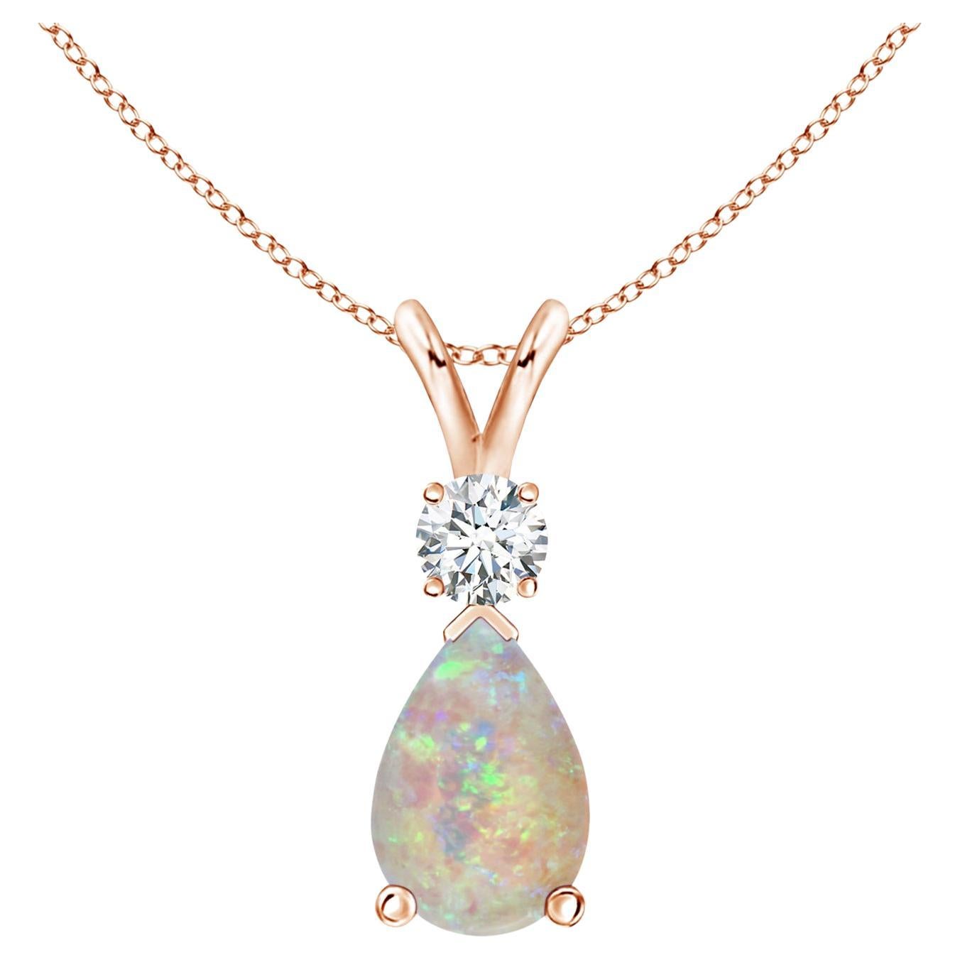 ANGARA Natural 0.90ct Opal Teardrop Pendant with Diamond in 14K Rose Gold For Sale