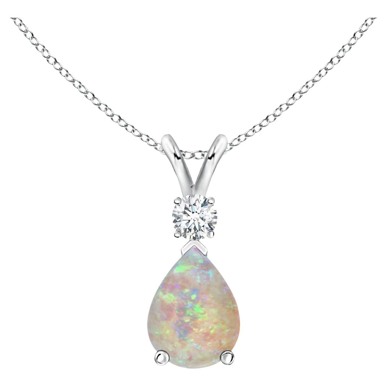 ANGARA Natural 0.70ct Opal Teardrop Pendant with Diamond in 14K White Gold For Sale