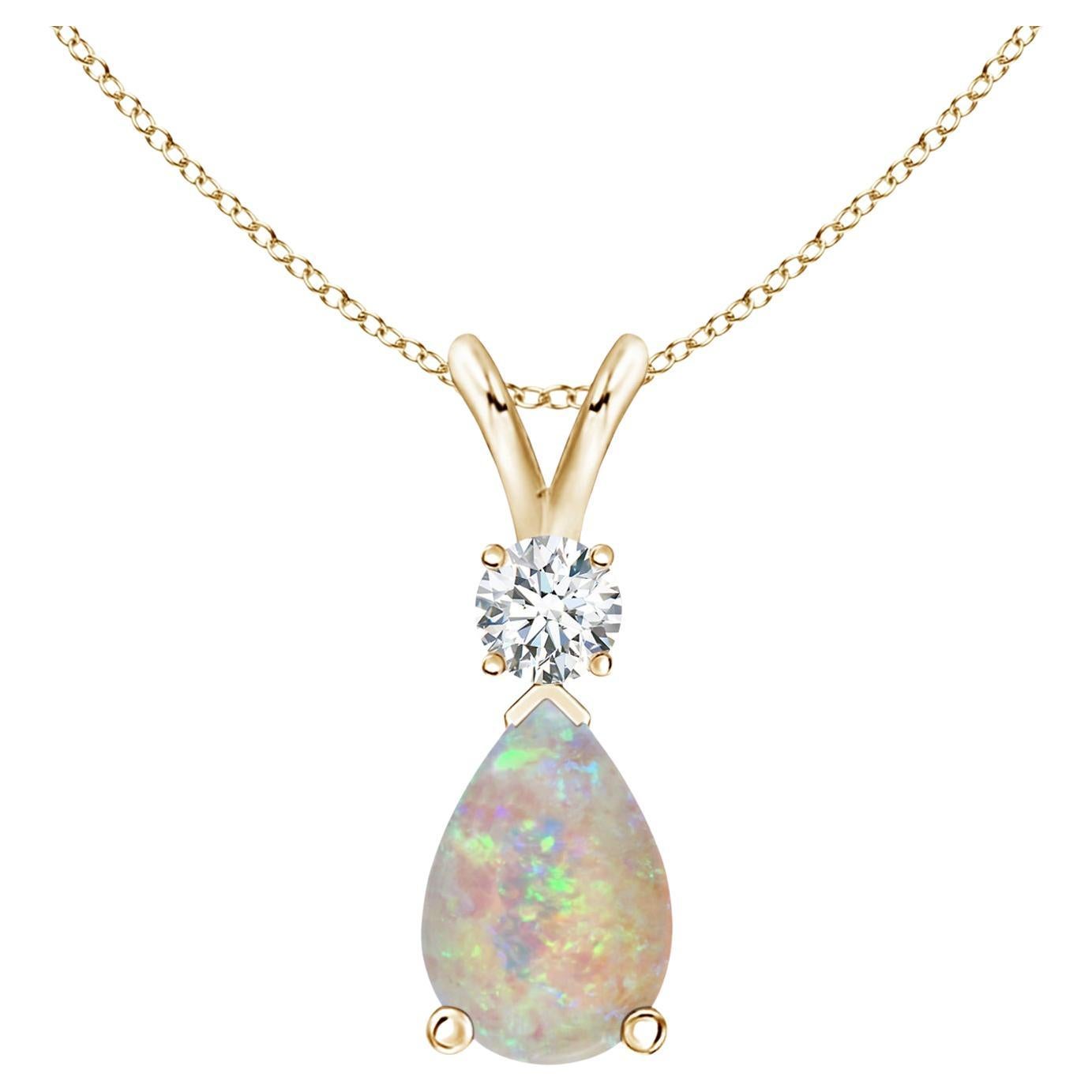 ANGARA Natural 1.15ct Opal Teardrop Pendant with Diamond in 14K Yellow Gold For Sale