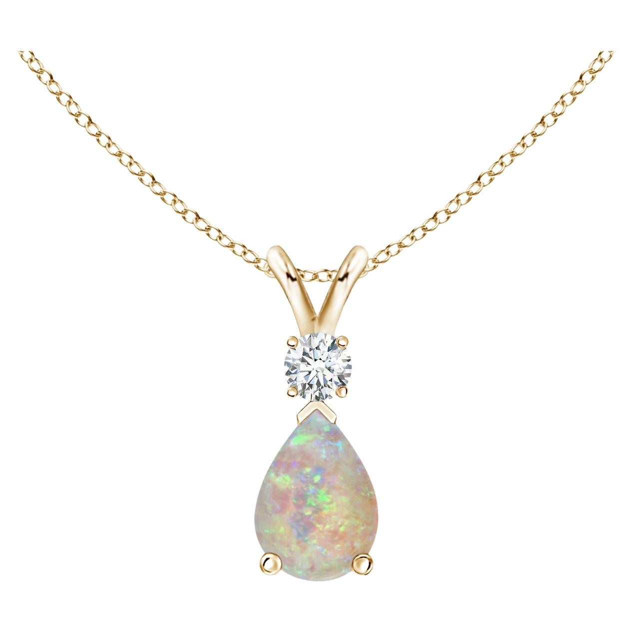 ANGARA Natural 0.42ct Opal Teardrop Pendant with Diamond in 14K Yellow Gold For Sale