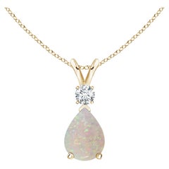 ANGARA Natural 0.70ct Opal Teardrop Pendant with Diamond in 14K Yellow Gold