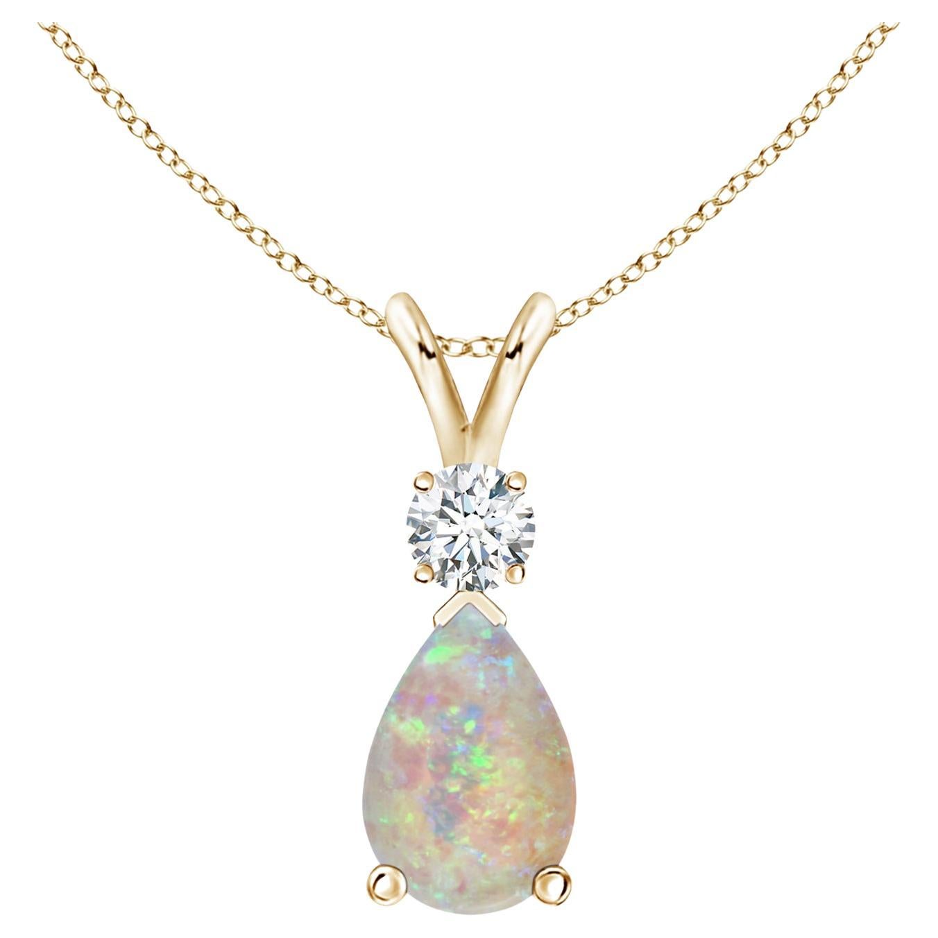 ANGARA Natural 0.90ct Opal Teardrop Pendant with Diamond in 14K Yellow Gold