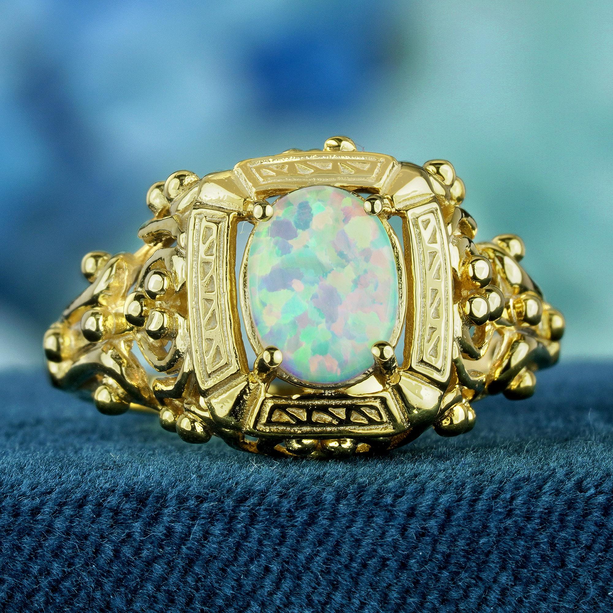 Experience timeless elegance elevated to new heights. Surrender to the captivating allure of our Opal Vintage Style Cocktail Filigree Ring. Meticulously crafted with an open yellow gold lacey band, adorned with swirling curves throughout. Let the