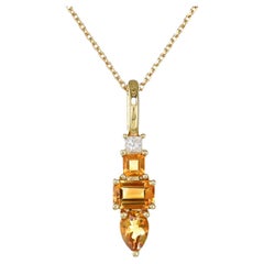 Colgante de oro amarillo de 14 quilates con diamantes y citrino naranja natural de 0,87 ct