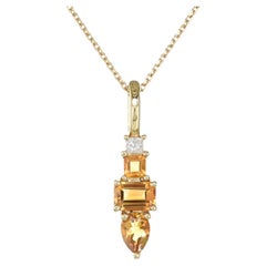 Colgante de oro amarillo de 14 quilates con diamantes y citrino naranja natural de 1,02 ct