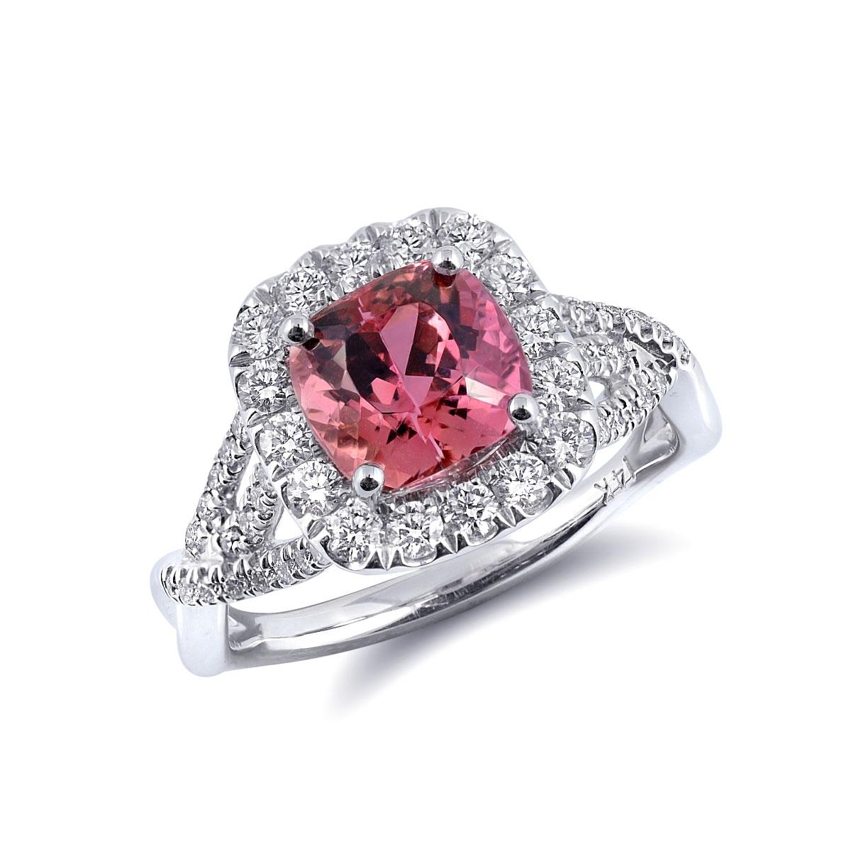 Experience the captivating allure of natural Imperial topaz with this exquisite 14K white gold ring. Complemented by sparkling diamonds, this piece showcases exceptional craftsmanship and the vibrant beauty of these precious gemstones. Perfect for