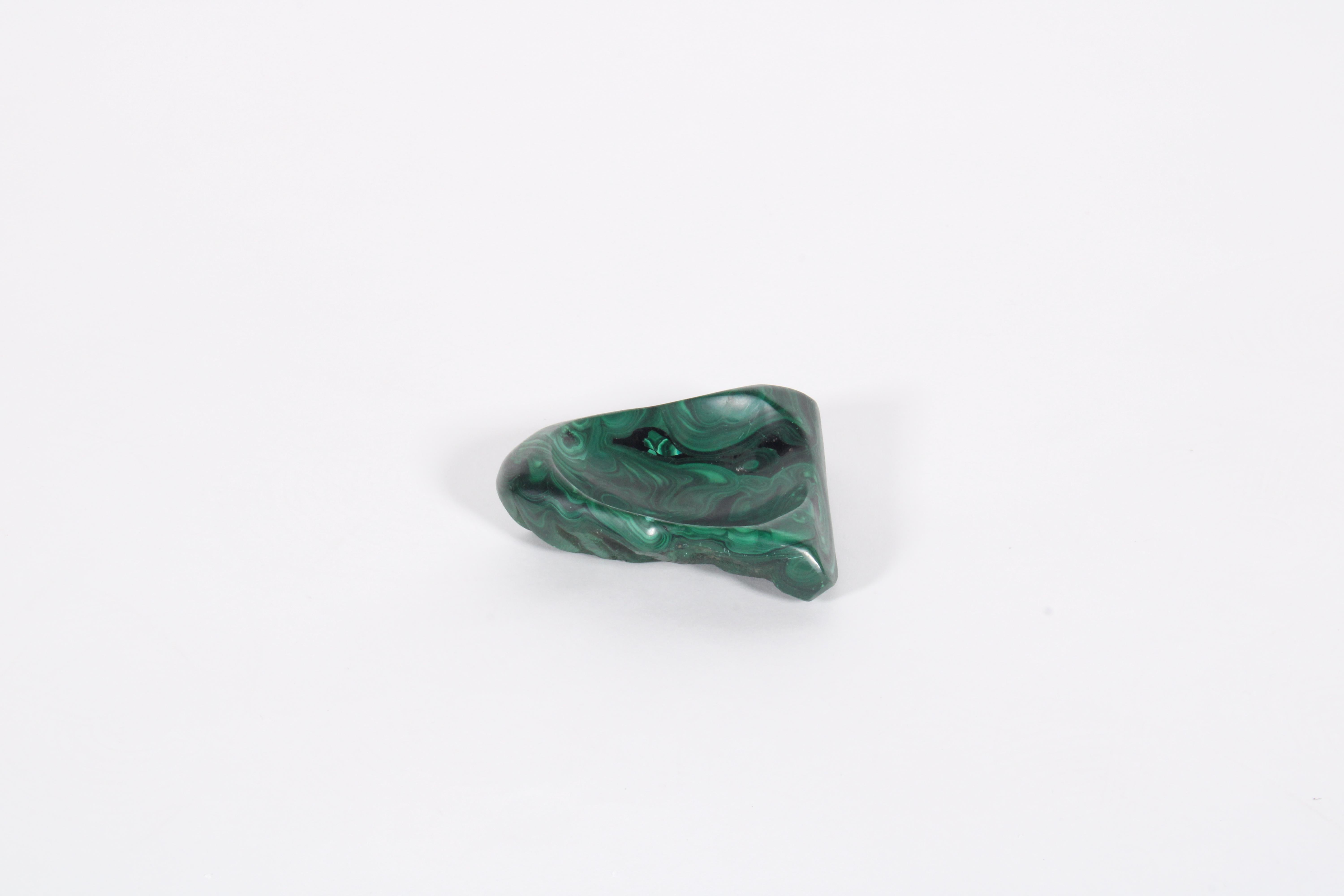 Stunningly beautiful natural organic form dish fashioned from the most amazing piece of malachite. Perfect as a piece of home decor or home accent this truly unique dish has a vivid green colouring and superb grain patten. Please see our additional