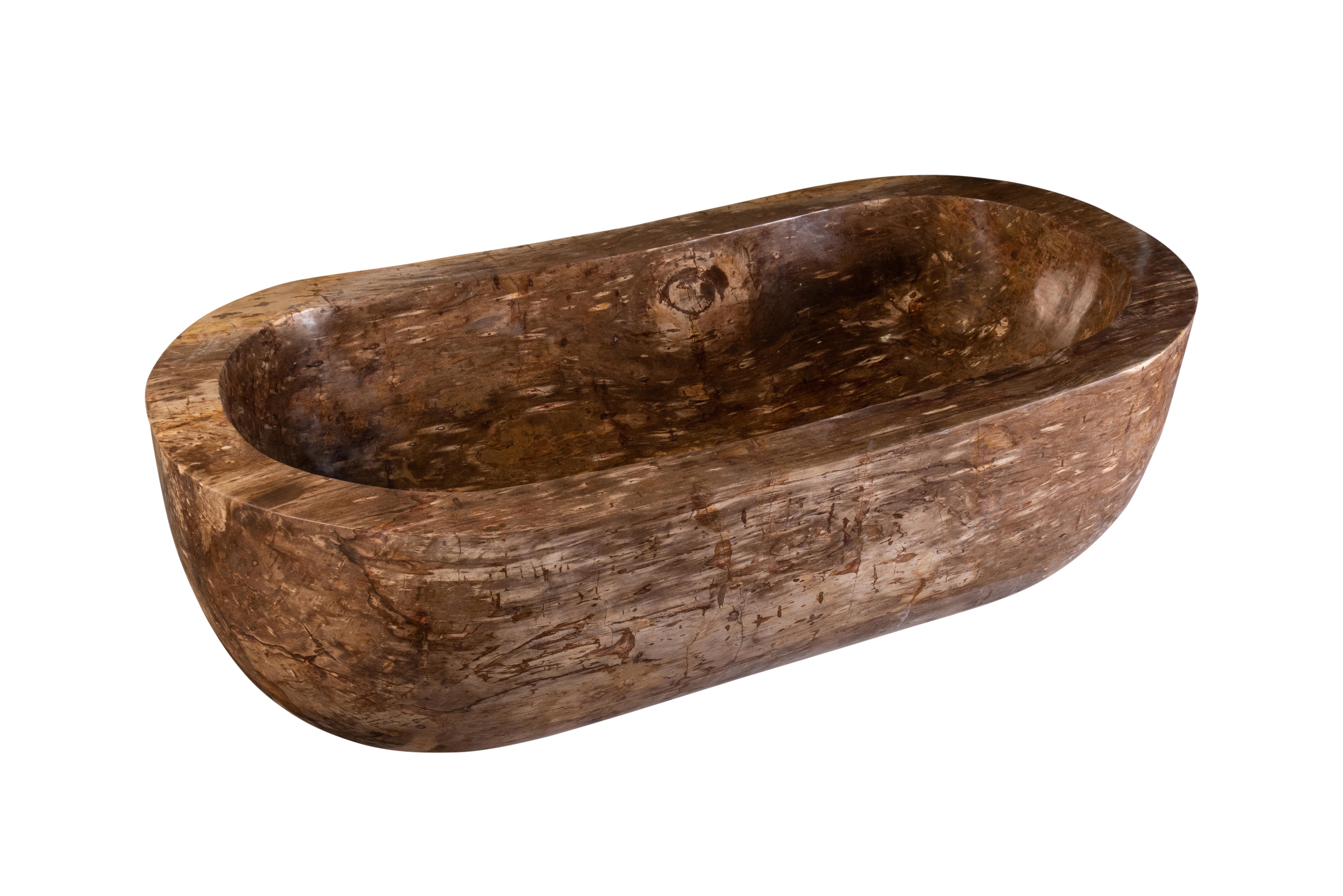 
This petrified wood bath is sculpted from fossilised wood as unique as the tree that it was originally carved from. Trees buried in sediment and protected from decay by oxygen are preserved into stunning original fossils, a 3 Dimensional