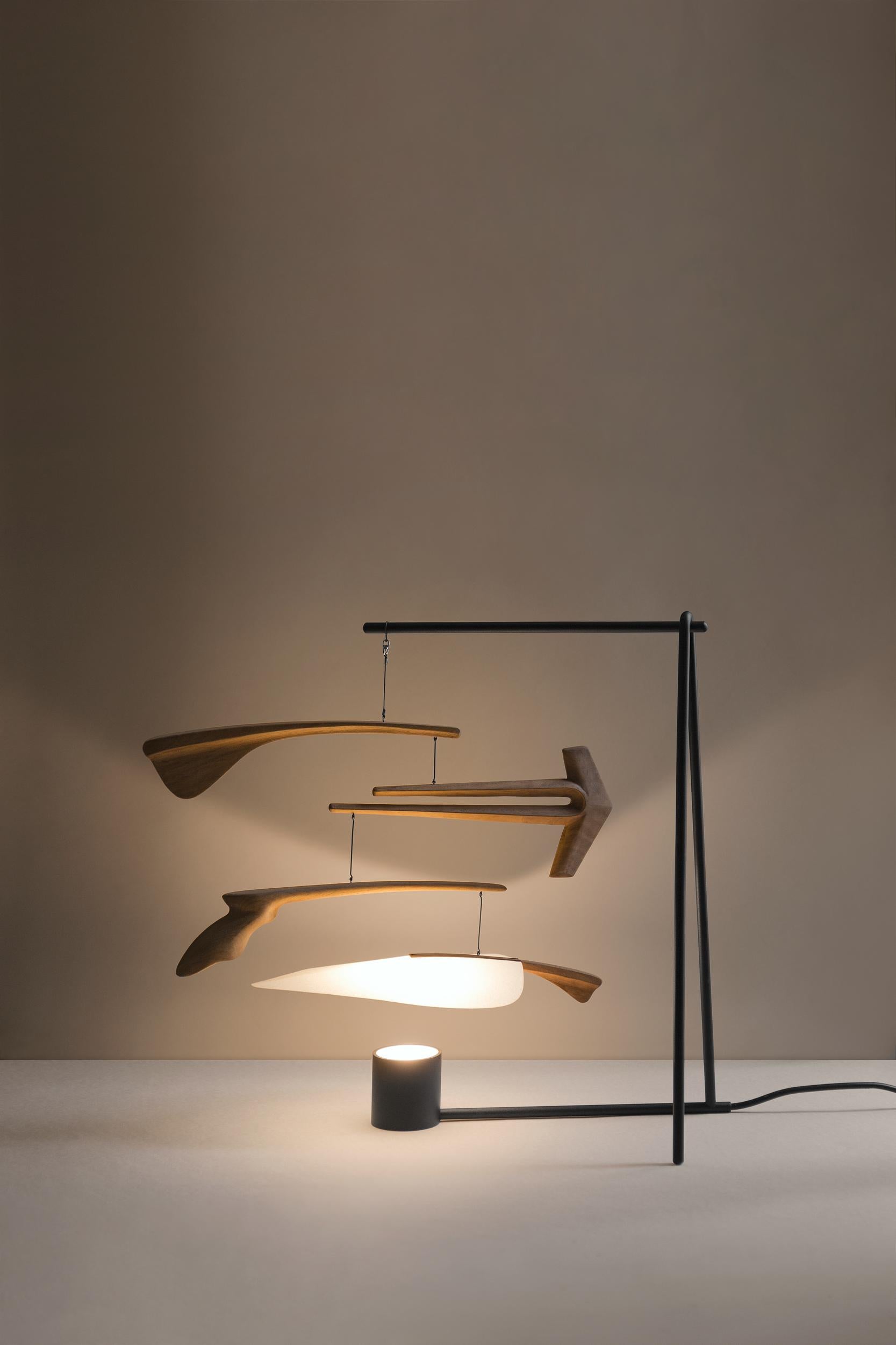 Natural Óseo - Mobile lamp by Federico Stefanovich
Dimensions: 45 x 47 x H 45 cm
Material: Solid inked oak wood with a high solid oil finish. Screens made of nitrocellulose coated paper. Structure made of powder coated steel.
Also available in