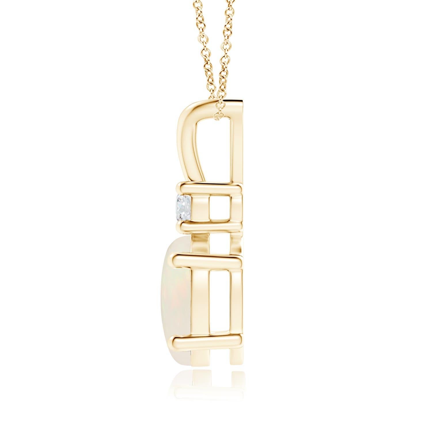 La magnifique opale ovale sertie est surmontée d'un diamant étincelant. Ce pendentif classique et élégant avec une balle en V est réalisé en or jaune 14k. Disponible en différents poids de carats. 

L'opale est la pierre de naissance du mois