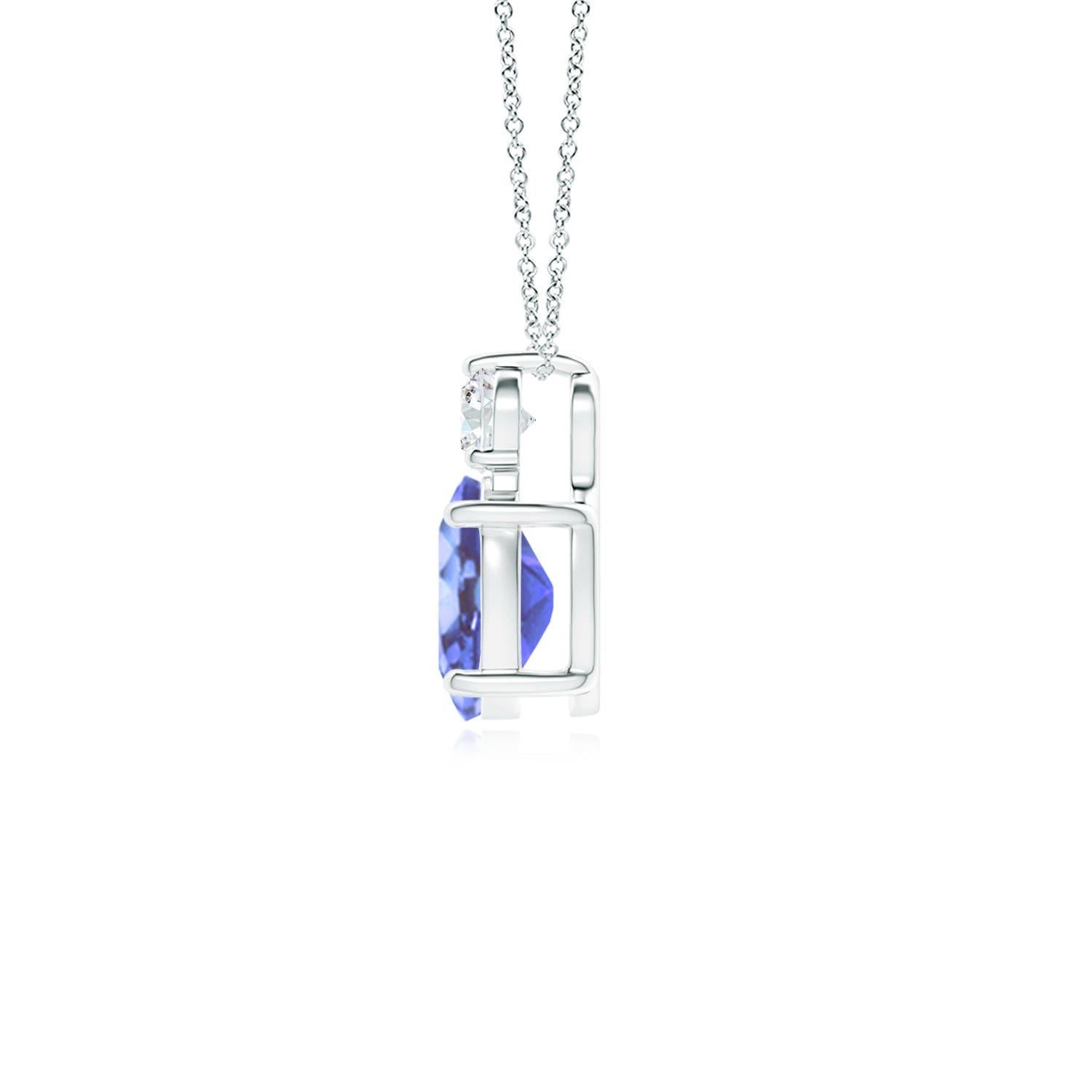 An oval tanzanite is topped with a glimmering round diamond, both held in prong settings. The alluring bluish-violet hue of the tanzanite is elevated by the diamond's unending sparkle. To add a dash of exquisiteness, this classic solitaire tanzanite
