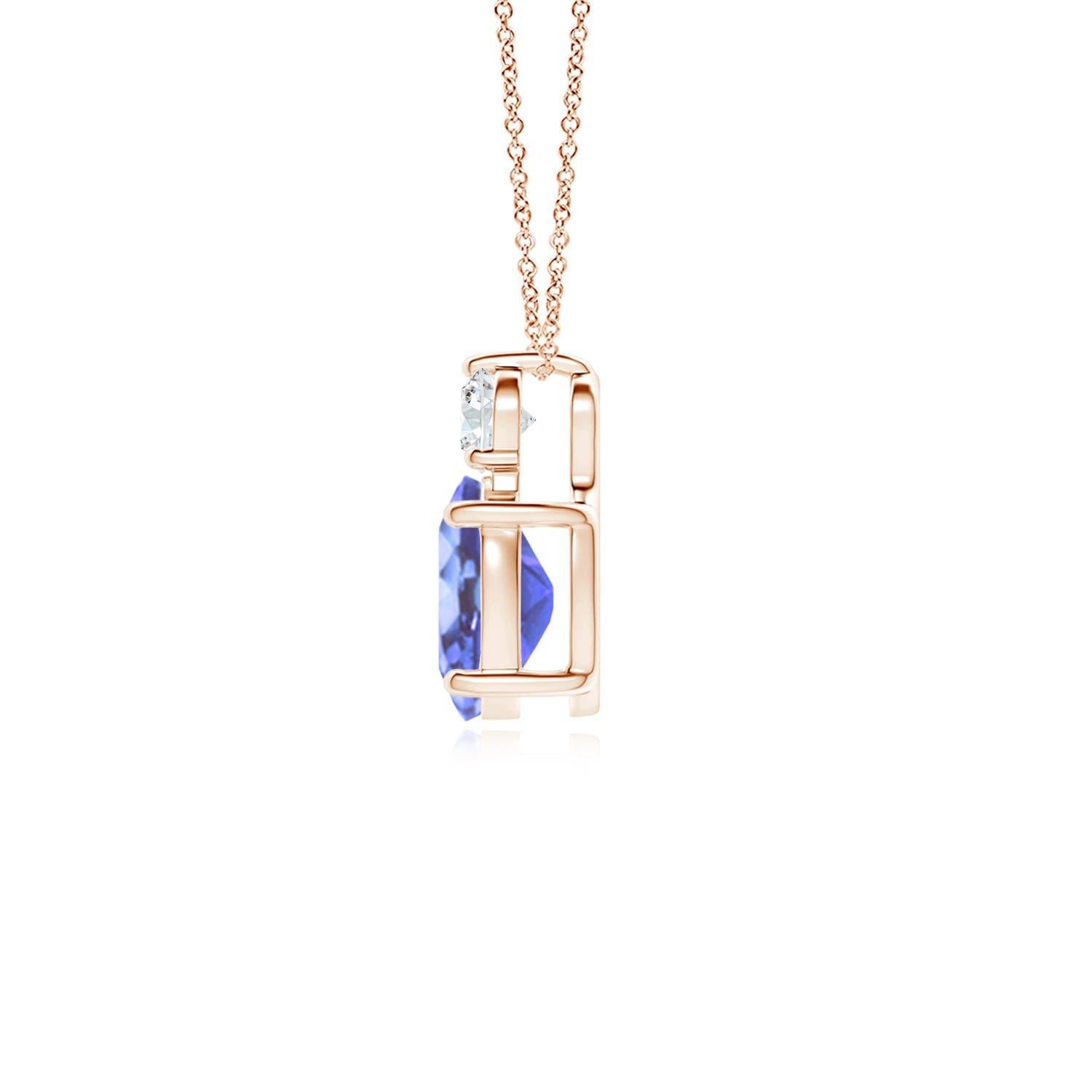 An oval tanzanite is topped with a glimmering round diamond, both held in prong settings. The alluring bluish-violet hue of the tanzanite is elevated by the diamond's unending sparkle. To add a dash of exquisiteness, this classic solitaire tanzanite