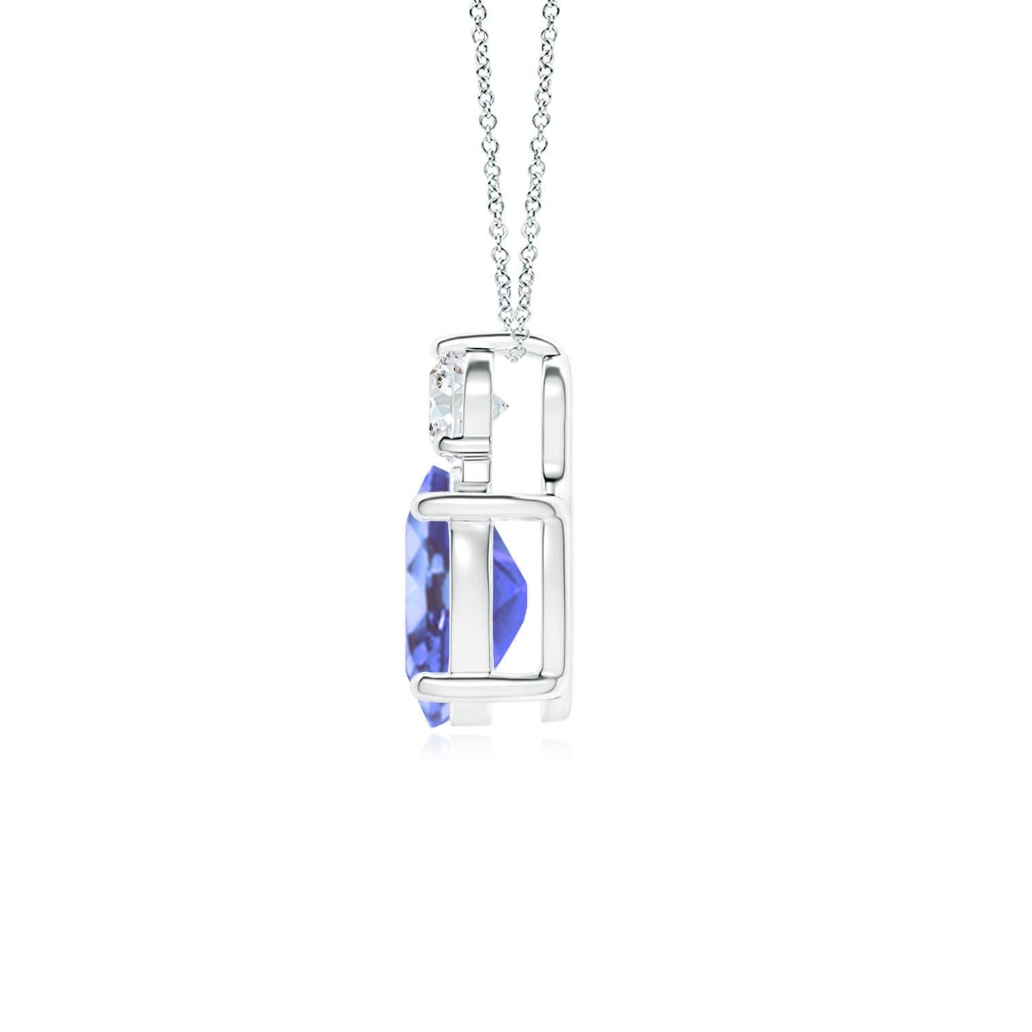 An oval tanzanite is topped with a glimmering round diamond, both held in prong settings. The alluring bluish-violet hue of the tanzanite is elevated by the diamond's unending sparkle. To add a dash of exquisiteness, this classic solitaire tanzanite