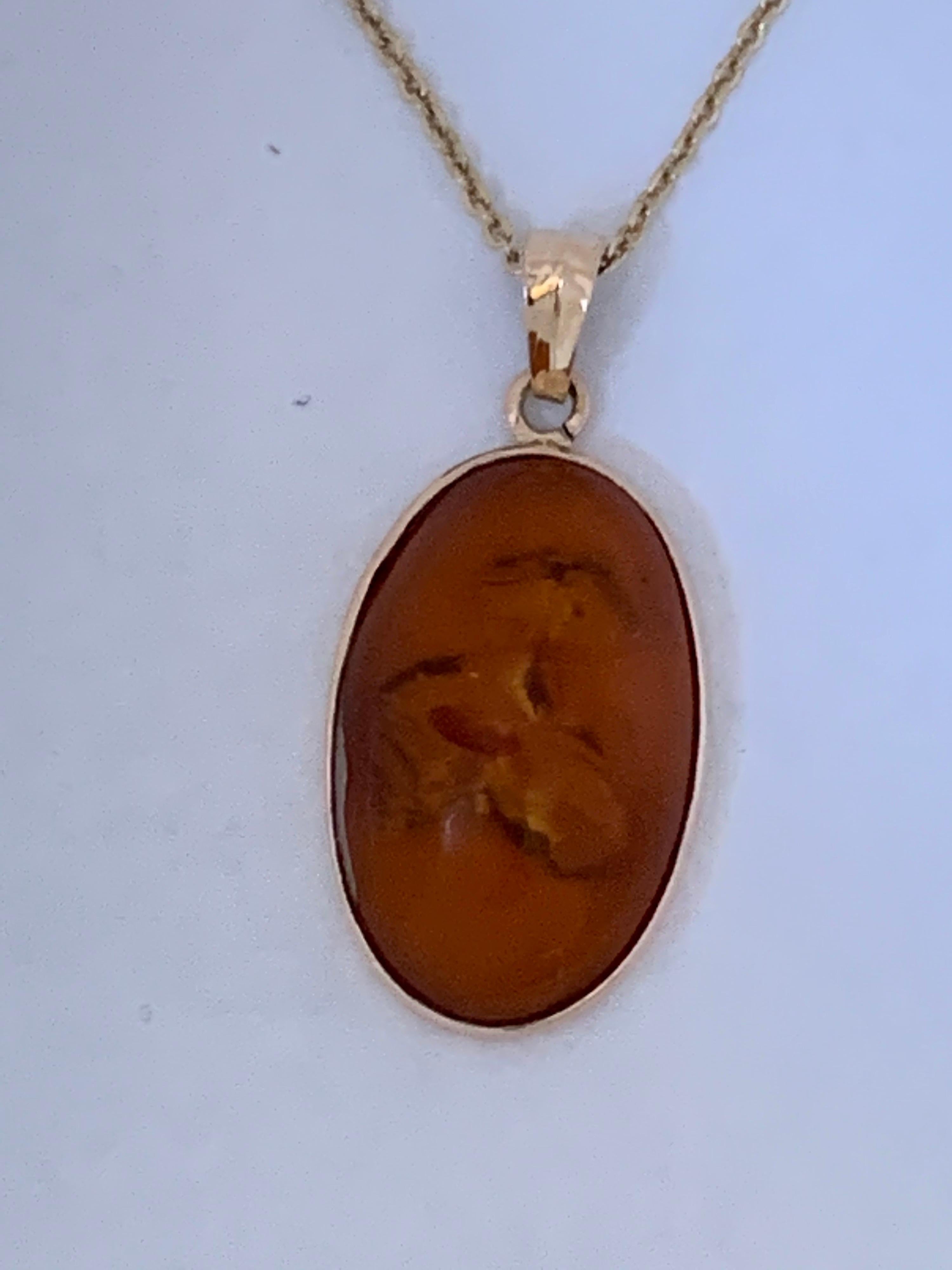 Natural Oval Amber Set in 14 Karat Gold For Sale 3
