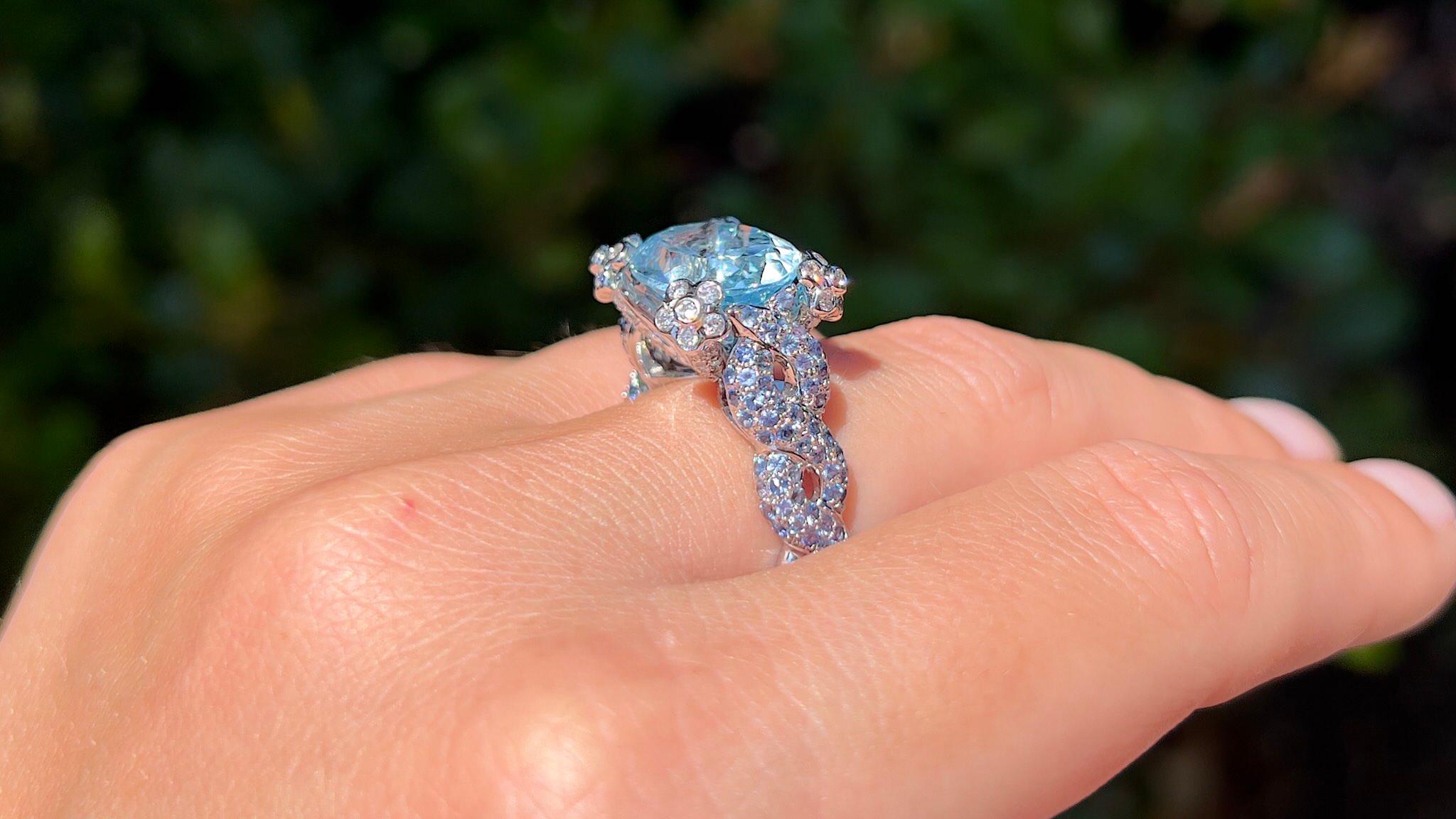 Art Nouveau Natural Oval Aquamarine Ring Blue Sapphires and Diamonds Setting 7.79 Carats 18K For Sale