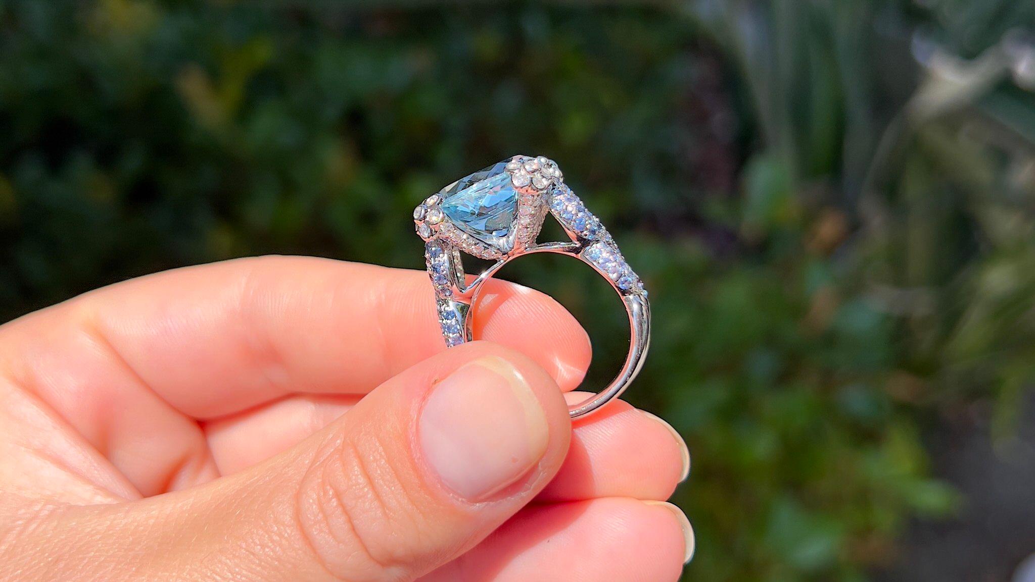 Natural Oval Aquamarine Ring Blue Sapphires and Diamonds Setting 7.79 Carats 18K In Excellent Condition For Sale In Laguna Niguel, CA