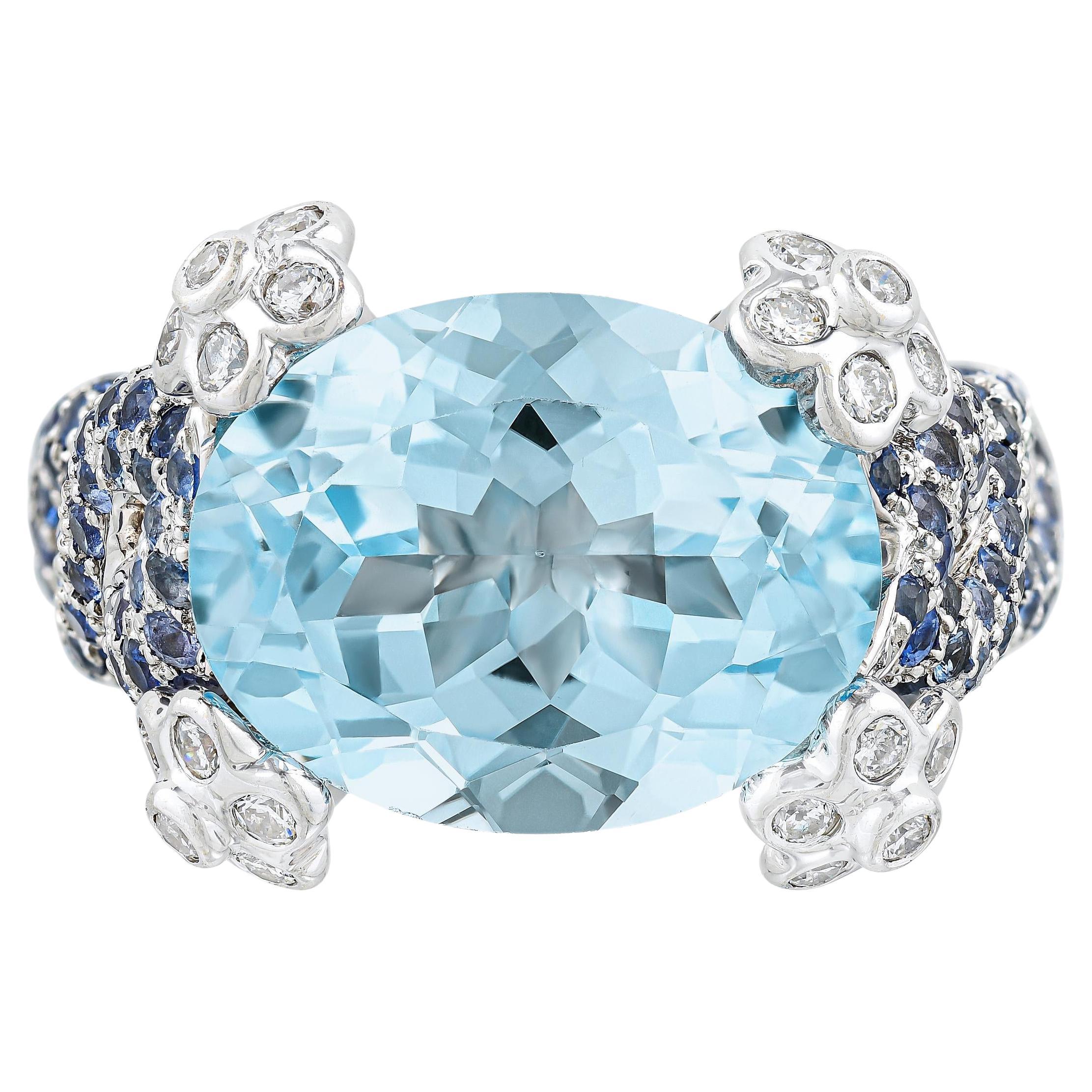 Natural Oval Aquamarine Ring Blue Sapphires and Diamonds Setting 7.79 Carats 18K For Sale