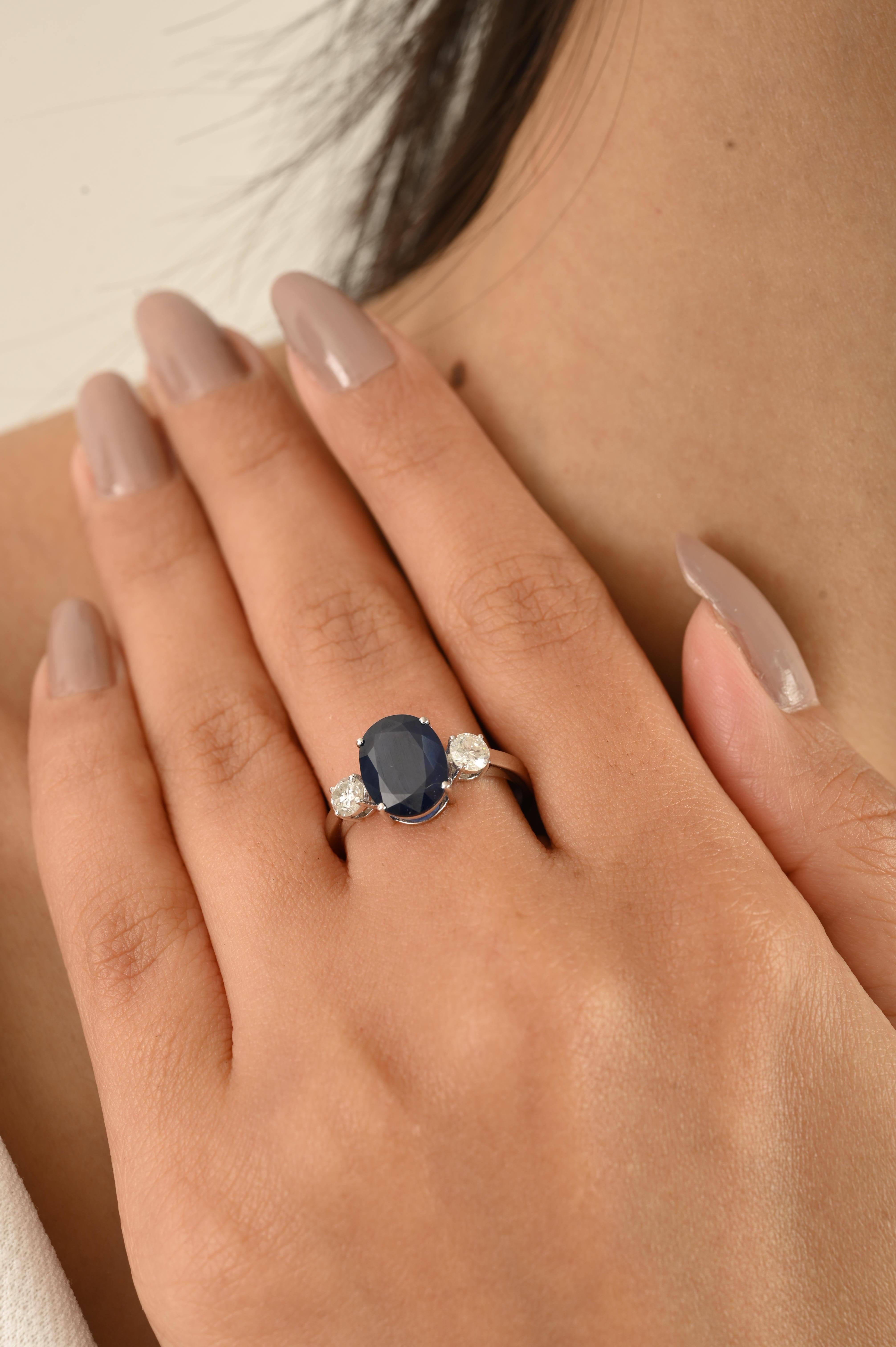 For Sale:  Natural Oval Blue Sapphire and Diamond Three-Stone Engagement Ring in 14k Gold 4