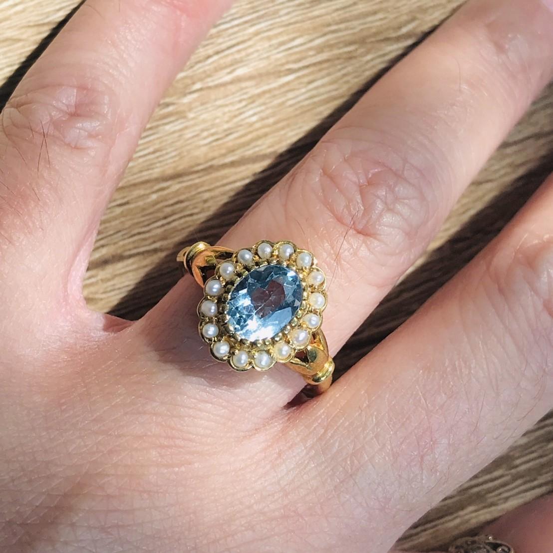 For Sale:  Natural Oval Blue Topaz with Pearl Halo Ring in 14K Yellow Gold 2