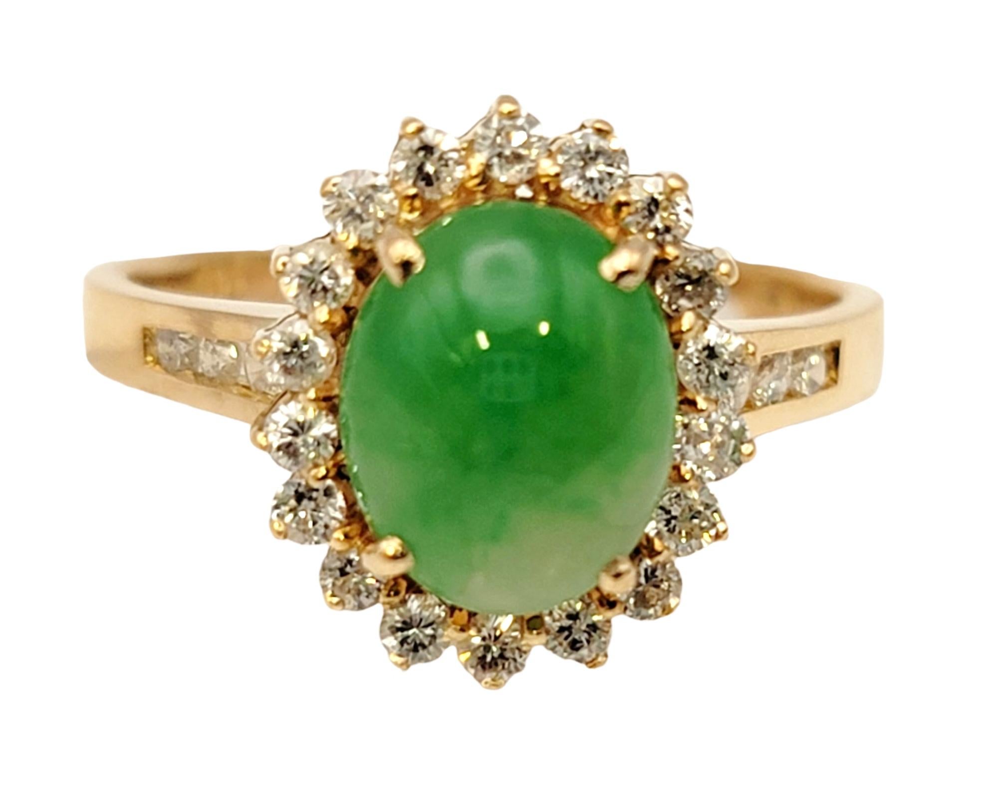 Ring size 7.5

Absolutely gorgeous jade and diamond halo ring. This amazing piece features a single oval cabochon natural jade stone prong set among a glittering halo of 18 round diamonds. Additional diamonds are set along the top portion of the