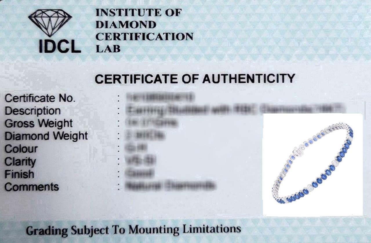 Natürliches Tennisarmband mit blauem Saphir und Diamant im Ovalschliff 14 Karat Weißgold im Angebot 1