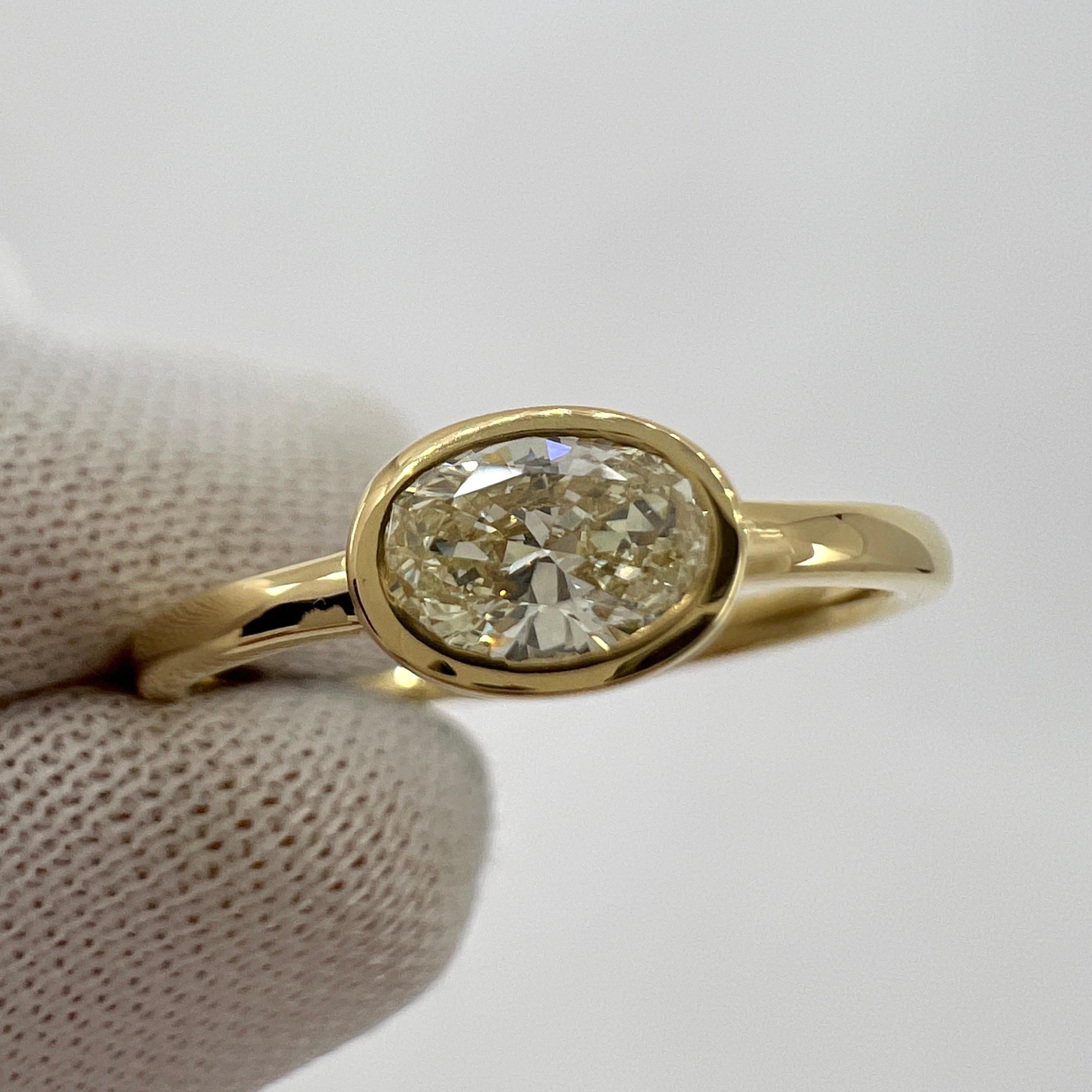 Women's or Men's Natural Oval Cut Light Yellow Diamond 18k Yellow Gold Solitaire East West Ring