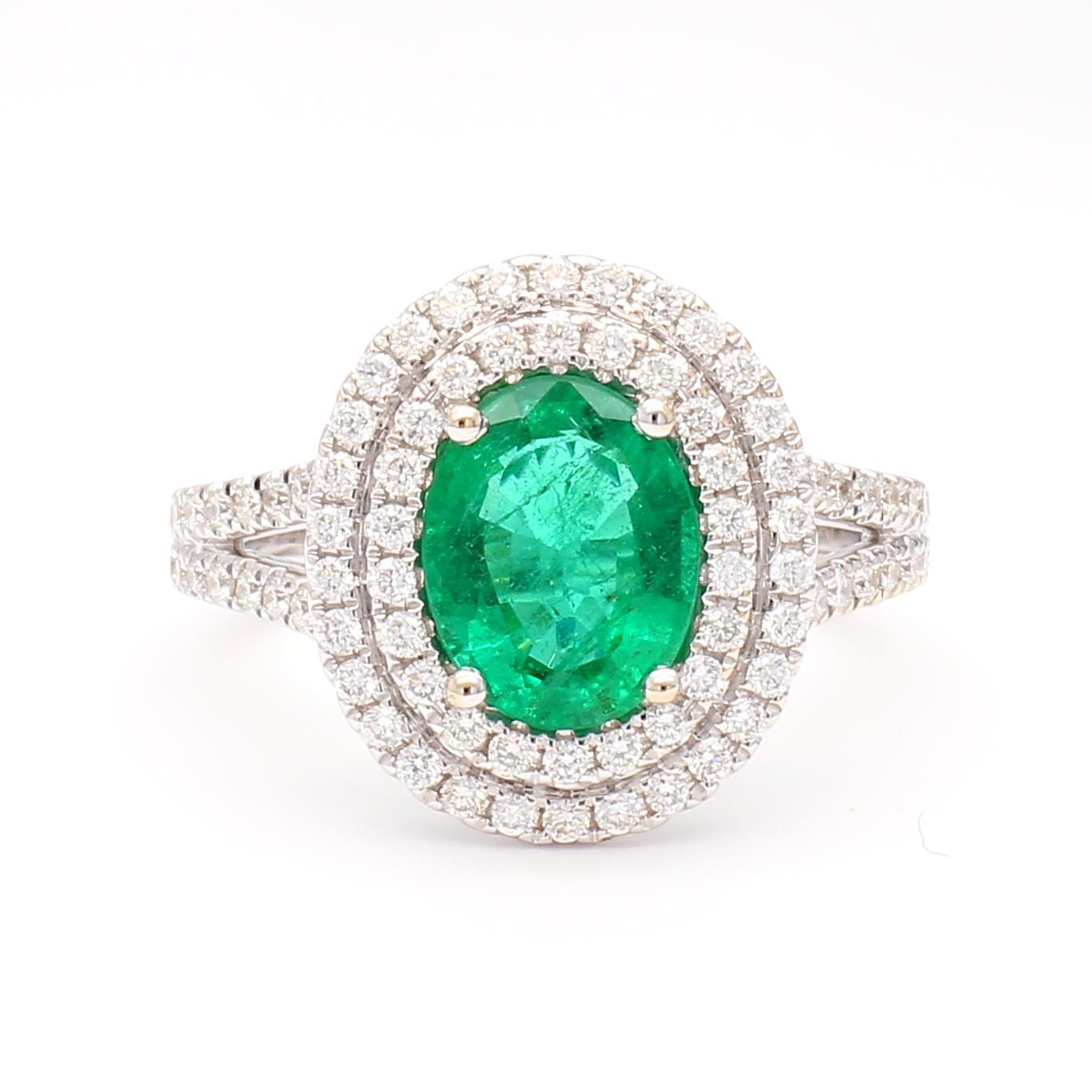 Contemporary Natural Oval Emerald and White Diamond 2.18 Carat TW Gold Cocktail Ring For Sale