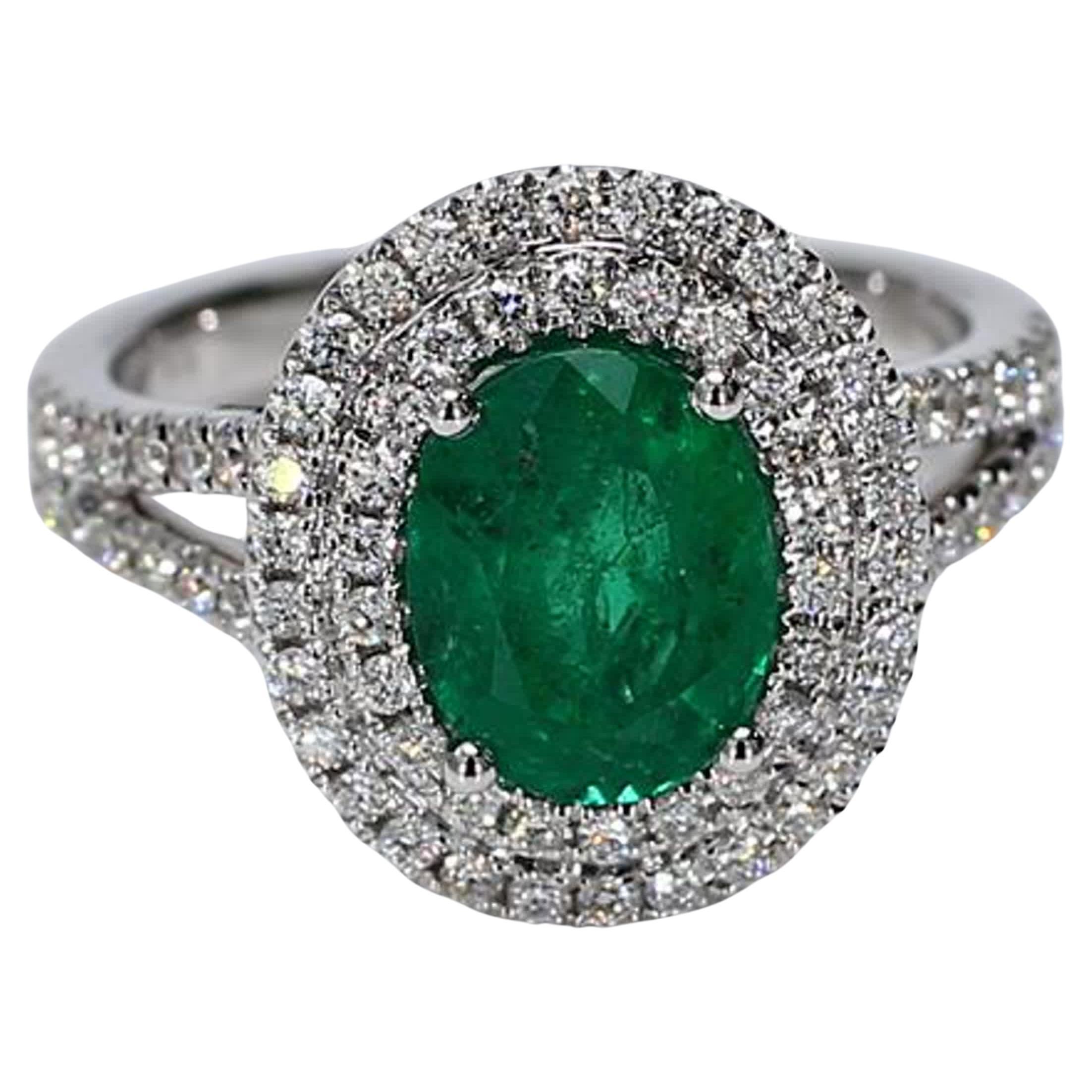 Natural Oval Emerald and White Diamond White Gold 2.18 Carat TW Cocktail Ring For Sale