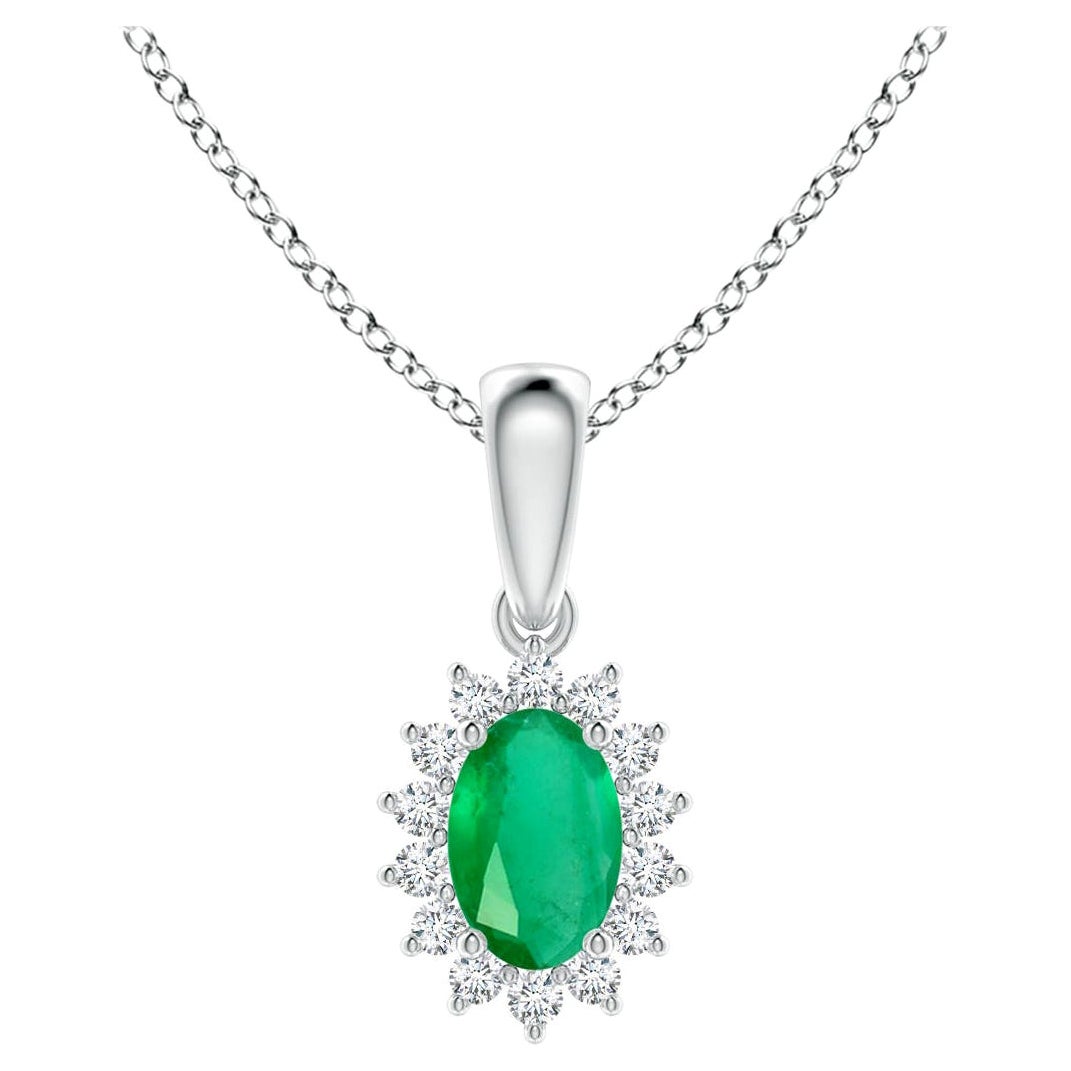 Colgante de esmeralda ovalada natural con halo de diamantes en oro blanco de 18 quilates