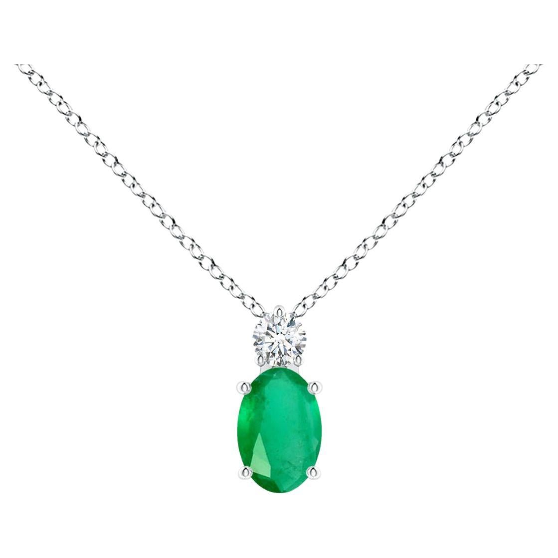 Pendentif solitaire en or blanc 14 carats avec émeraude ovale naturelle et diamants en vente