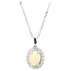 Natural Oval Opal and White Diamond 1.08 Carat TW Gold Drop Pendant