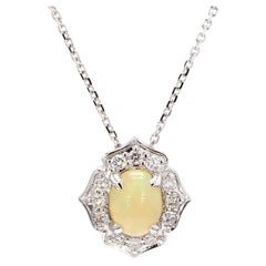 Natural Oval Opal and White Diamond 1.14 Carat TW Gold Drop Pendant