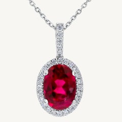 Natural Oval Rubellite Tourmaline and White Diamond 2.33 Carat TW Gold Pendant