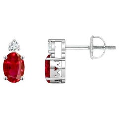 ANGARA Natural Oval 0.50ct Ruby Stud Earrings with Diamond in 14K White Gold
