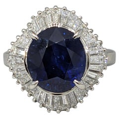 Natural Oval Sapphire 6.26ct Ballerina Ring with Diamonds in Platinum