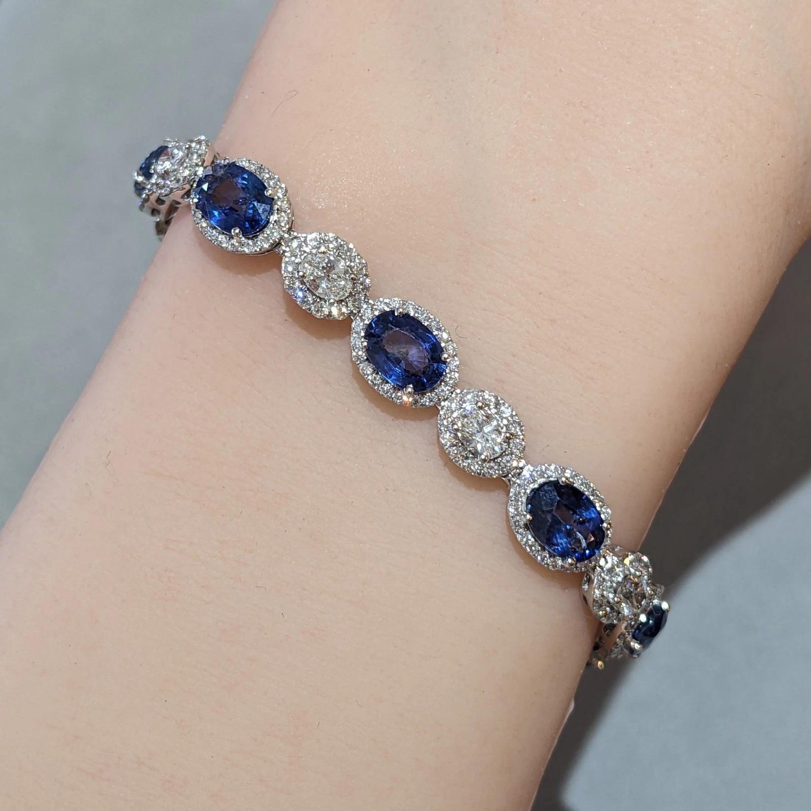 Natürliches ovales Saphir- und Diamantarmband aus 14k Weißgold 

Das Saphir- und Diamantarmband besteht aus 10 ovalen blauen Natursaphiren mit einem Gesamtgewicht von 13,97 Karat, die sich mit 10 ovalen Naturdiamanten abwechseln und in 14 Karat