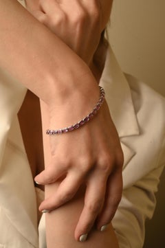 Natural Oval Shaped Pink Sapphire Tennis Bracelet in 18K White Gold
