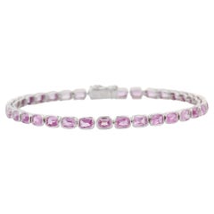 Natural Oval Shaped Pink Sapphire Tennis Bracelet in 18K White Gold 