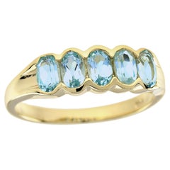 Natural  Oval Sky Blue Topaz Vintage Style Five Stone Ring in Solid 9K Gold