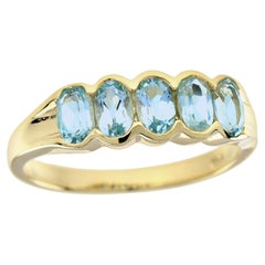 Topaz Three-Stone Rings