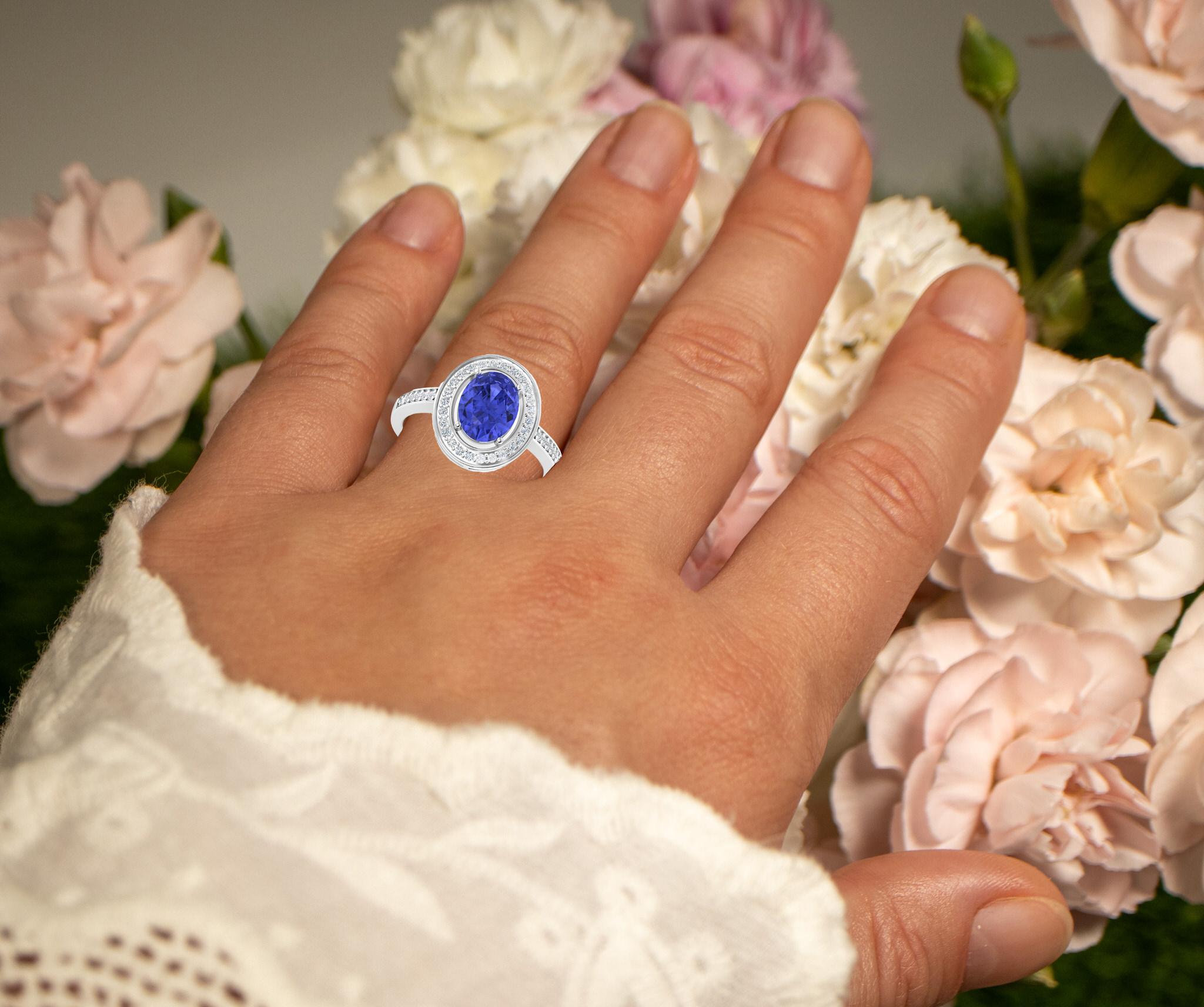 It comes with the appraisal by GIA GG/AJP
All Gemstones are Natural
1 Tanzanite = 1.70 Carat
38 Diamonds = 0.23 Carats
Metal: 14K White Gold
Ring Size: 7* US
*It can be resized complimentary
