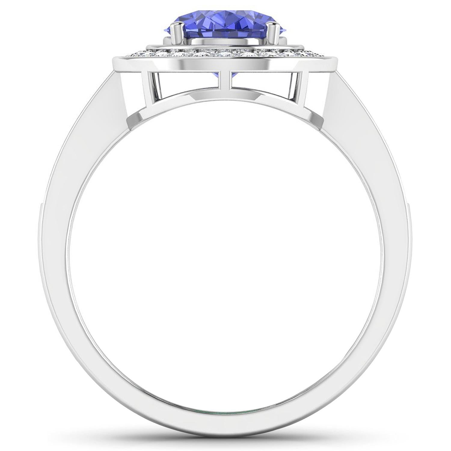 Contemporary Natural Oval Tanzanite Ring Diamond Halo 14K White Gold For Sale